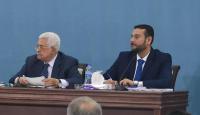 اياد صافي بجوار الرئيس محمود عباس