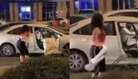 فتاة ترقص في أحد شوارع الرياض
