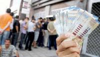 طابور موظفين بانتظار استلام الراتب