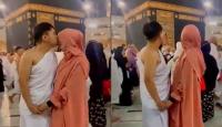 شاب وفتاة أمام للكعبة