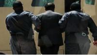 لحظة إدخال صدام حسين غرفة الإعدام