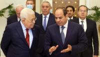 الرئيس الفلسطيني محمود عباس ونظيره المصري السيسي