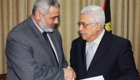 الرئيس الفلسطيني محمود عباس وإسماعيل هنية