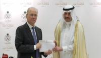 محمد مصطفى رئيس الوزراء الفلسطيني مع السفير السعودي غير المقيم في القدس