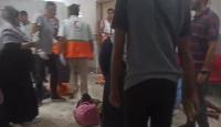 تعامل طاقم الهلال الأحمر مع اصابات مدرسة رفيدة بدير البلح