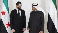 الشرع ومحمد بن زايد