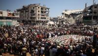 فلسطينيون يشاركون في تشييع رفات 112 شخصا من عائلتي حسينة وأبو شريعة