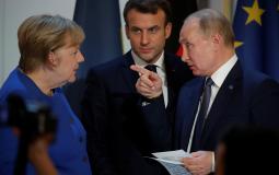الرئيس الروسي بوتين والرئيس الفرنسي ماكرون وميركل المستشارة الألمانية