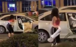فتاة ترقص في أحد شوارع الرياض