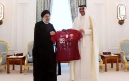 امير قطر يهدي الرئيس الايراني قميص المنتخب القطري
