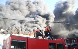 الدفاع المدني في غزة خلال مهمة اطفاء حريق
