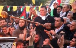 احمد حلس عضو اللجنة المركزية لحركة فتح يوقد شعلة الانطلاقة
