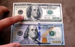 100 دولار مزورة