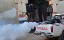 خلال رش المبيدات في قرية العليقات