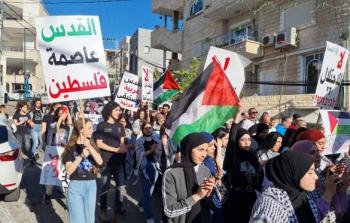 جانب من المشاركين في المسيرة في طمرة
