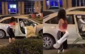 فتاة ترقص في أحد شوارع الرياض