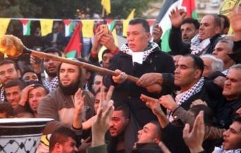 احمد حلس عضو اللجنة المركزية لحركة فتح يوقد شعلة الانطلاقة