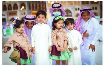 أطفال يحتفلون في العيد بالسعودية