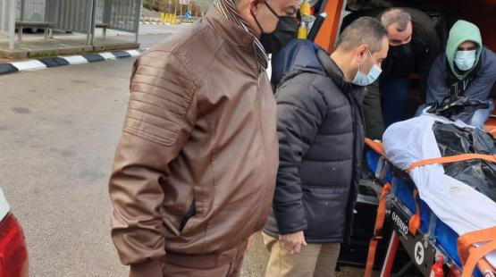 أثناء  تسلم جثمان الشهيد