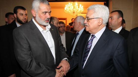 الرئيس الفلسطيني محمود عباس واسماعيل هنية