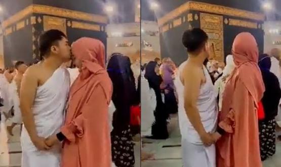 شاب وفتاة أمام للكعبة