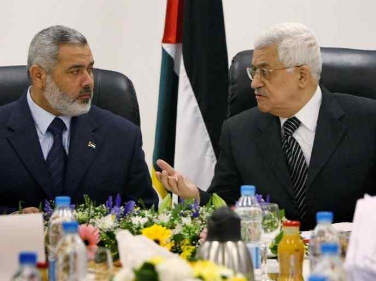الرئيس محمود عباس ورئيس حركة حماس اسماعيل هنية