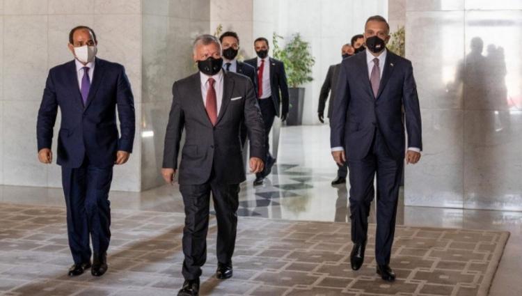 ملك الاردن والرئيس المصري ورئيس وزراء العراق