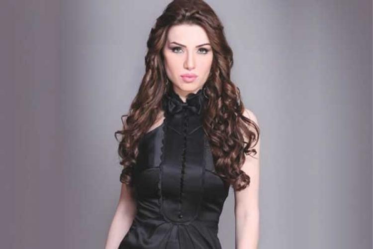 الإعلامية منى عبدالوهاب