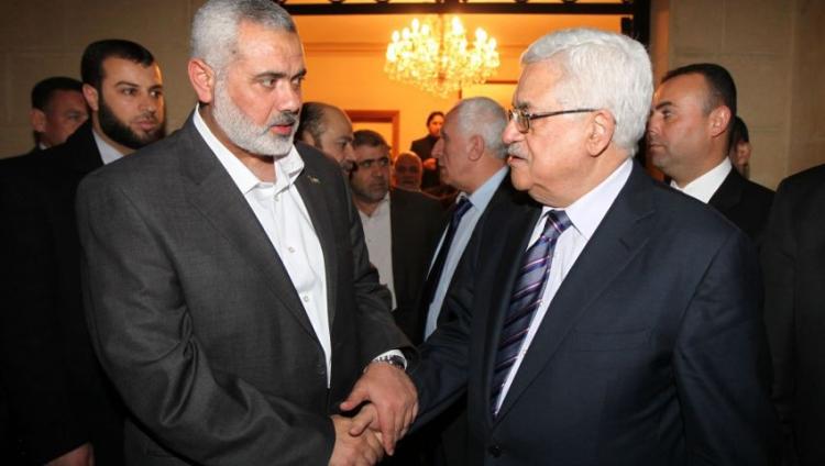 الرئيس الفلسطيني محمود عباس واسماعيل هنية