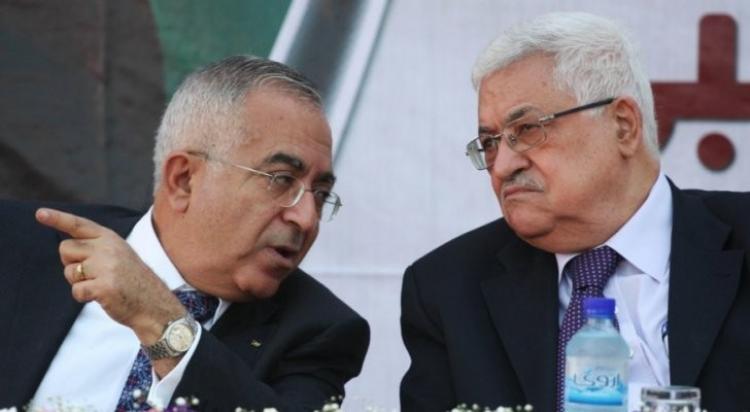 الرئيس الفلسطيني محمود عباس وسلام فياض