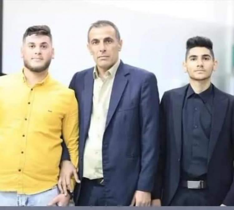 المغدور مع ابنيه
