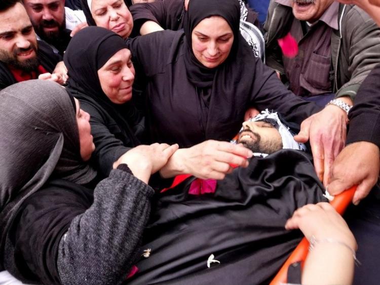 خلال تشييع الشهيد محمد حرزالله