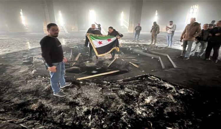 إشعال النيران في ضريح حافظ الأسد