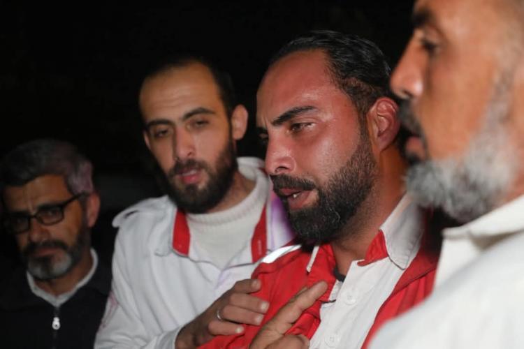 جانب من انتشال جثامين مسعفي الهلال الأحمر الفلسطيني
