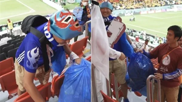 المشجعين اليابانيين يجمعون القمامة
